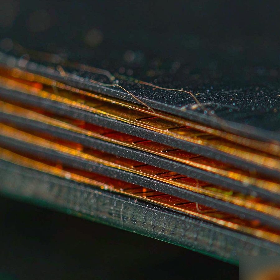 Cross-section of a multilayer PCB showing copper and dielectric layers