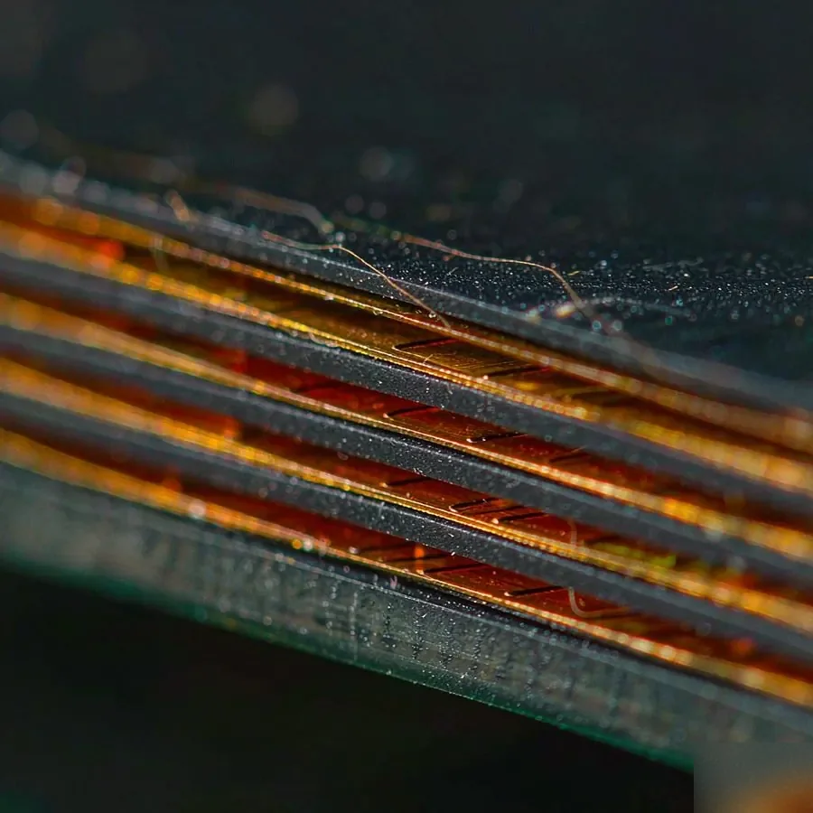 Cross-section of a multilayer PCB showing copper and dielectric layers